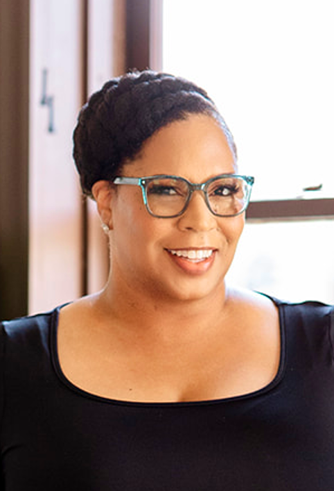 Headshot of an African American Woman wearing glasses